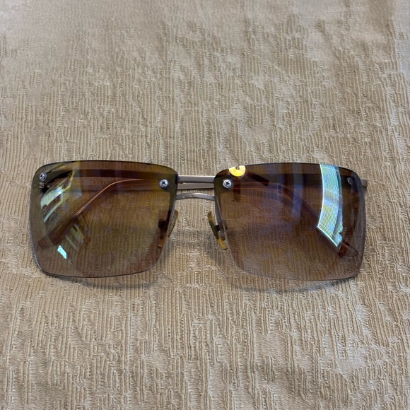 Brown Rimless Sunglasses Louis Vuitton- price represents age
